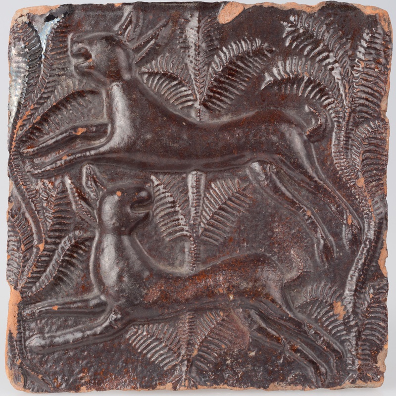 Kafel z parą uciekających zajęcy