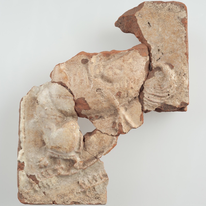 Kafel ze zwierzęciem z głową w koronie