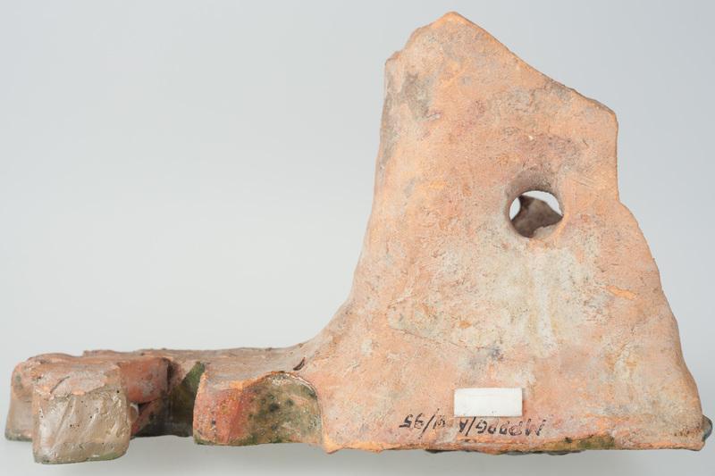 Kafel z wyobrażeniem głowy Chrystusa w koronie cierniowej i częścią w formie lilii