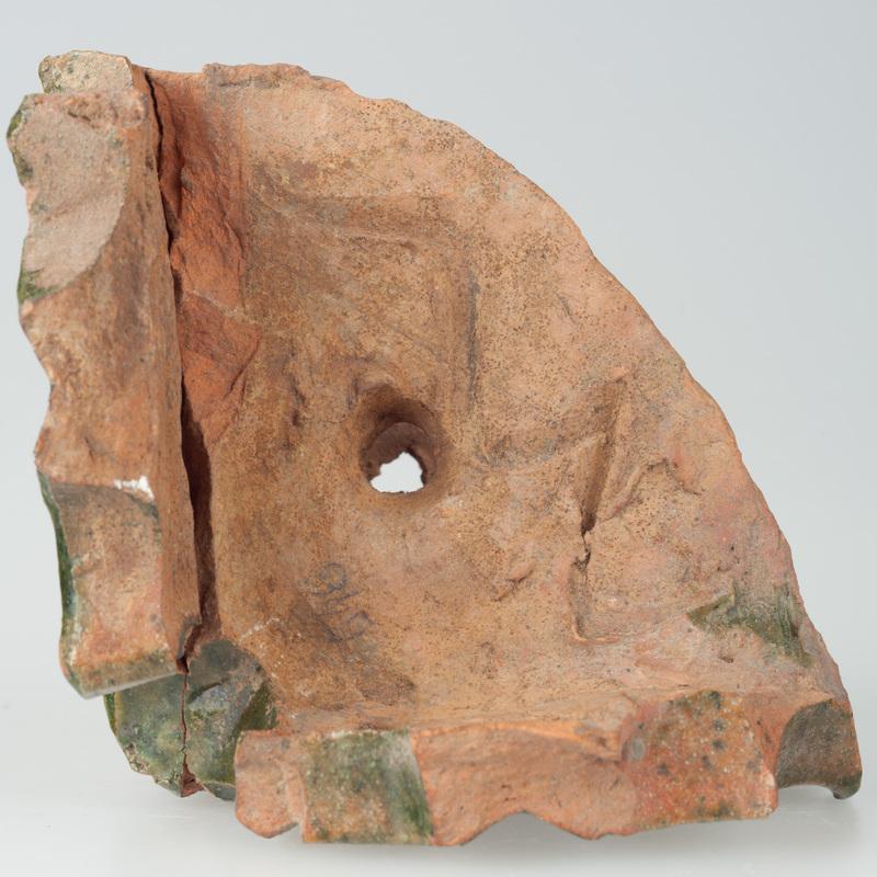 Kafel zdobiony czwórliściem i lilią