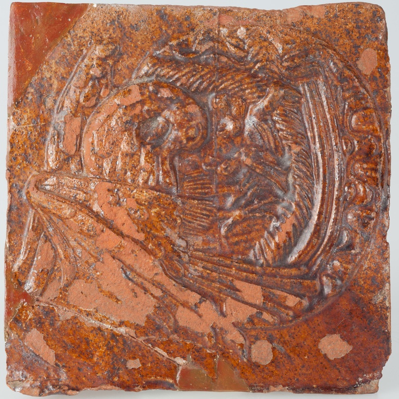 Kafel z pelikanem karmiącym pisklęta