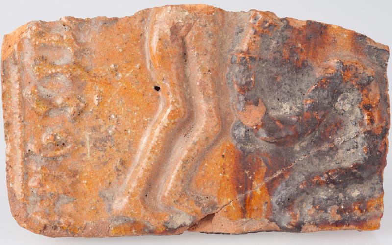 Kafel z wyobrażeniem sceny kuszenia Adama i Ewy w Raju