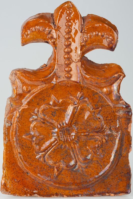 Kafel z rozetą w kółku z częścią w formie lilii