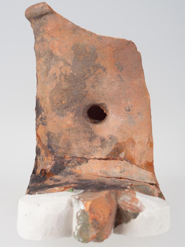 Kafel z wizerunkiem Jezusa Chrystusa i częścią w formie lilii