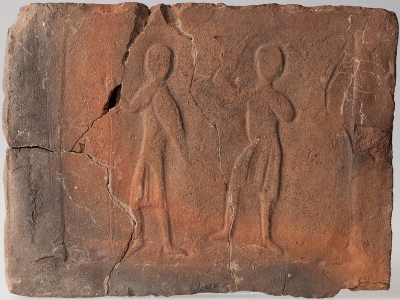 Płytka z wyobrażeniem wojowników