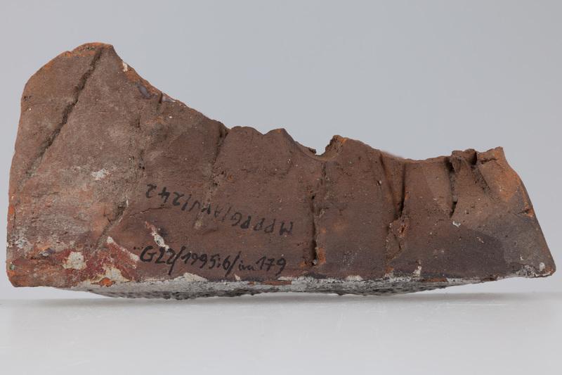 Kafel z wyobrażeniem syreny z dwoma ogonami