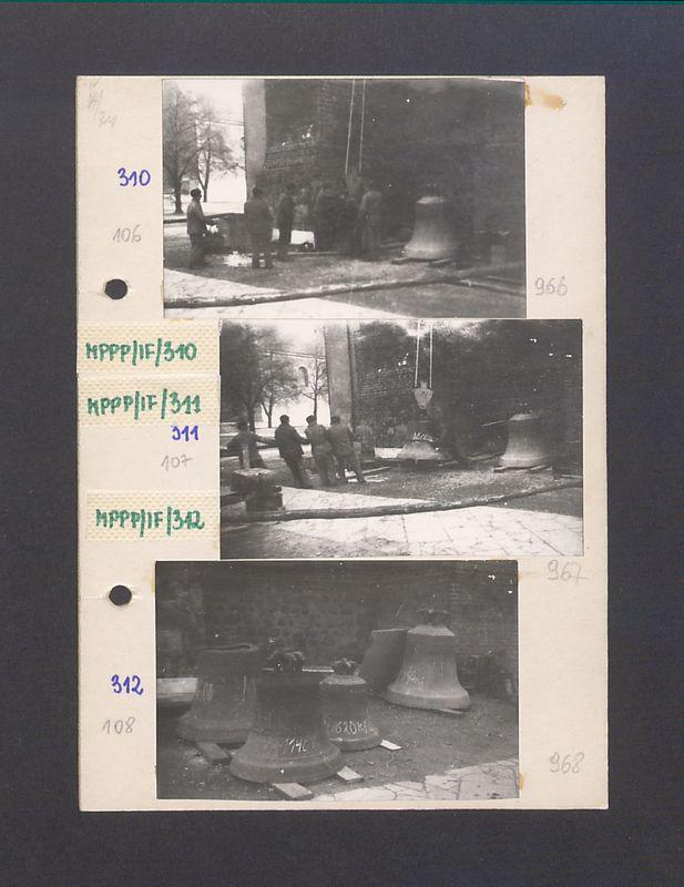 Zawieszanie dzwonu na wieży katedry.