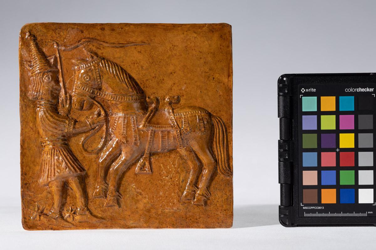 Kafel z motywem człowieka i konia