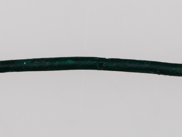 Fragment szpili brązowej