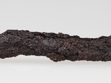 Fragment przedmiotu żelaznego  wykonanego z pręta o przekroju okrągłym