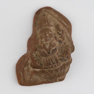 Ceramiczna płaskorzeźba, postać